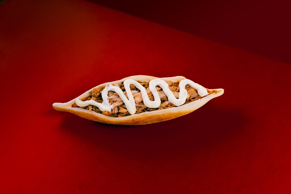 Illustrative stock photograph: Chicken sandwich made in Kuwait. This may differ from the café's actual product.