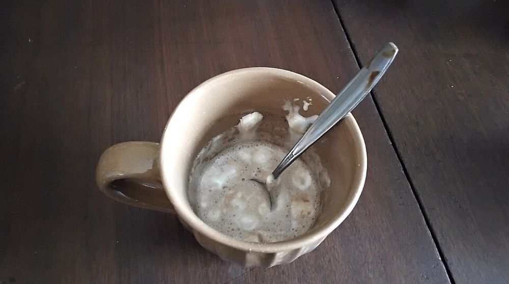 Illustrative stock photograph: A cup of almost finished hot chocolate with marshmallows.. This may differ from the café's actual product.
