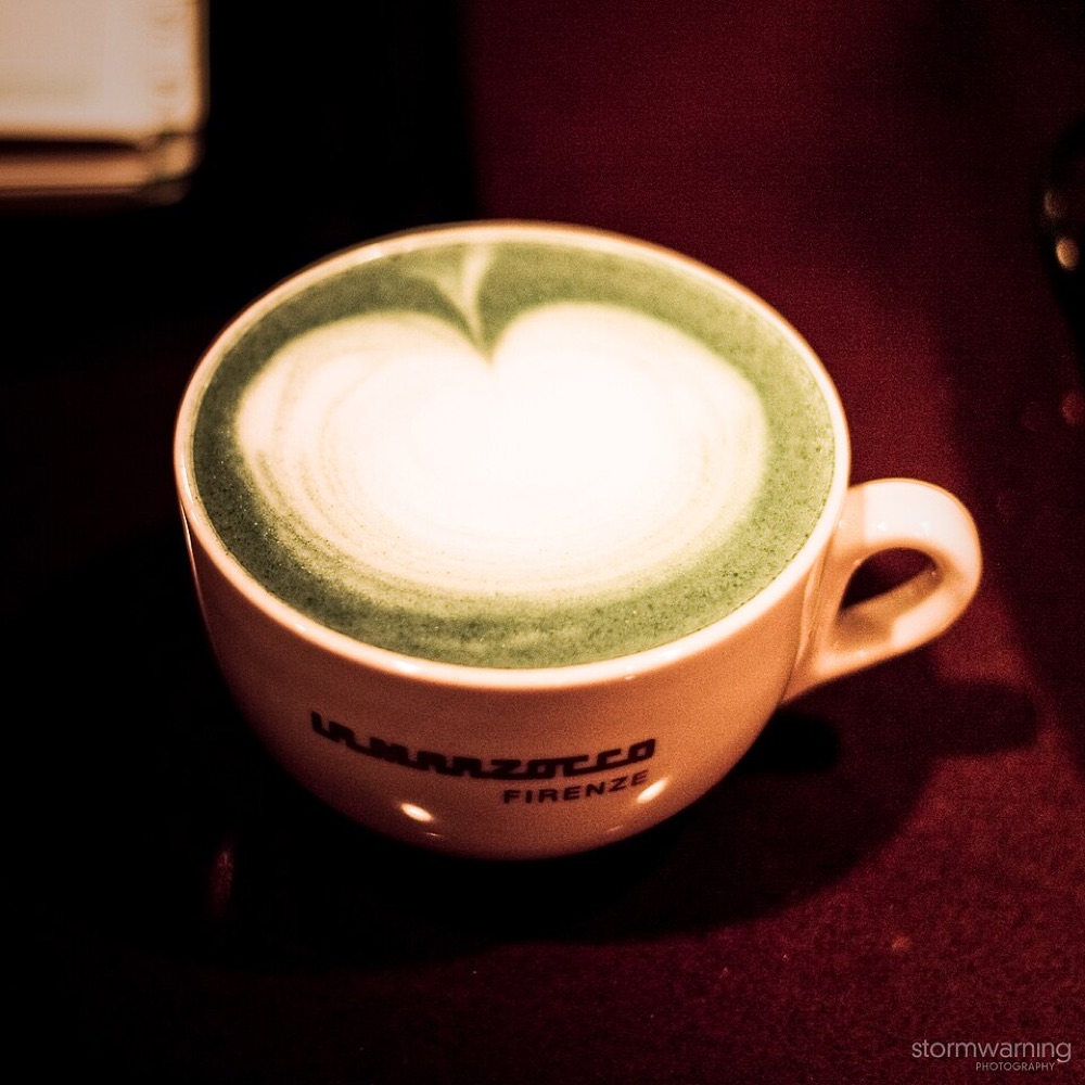 Illustrative stock photograph: Matcha green tea latte art. This may differ from the café's actual product.